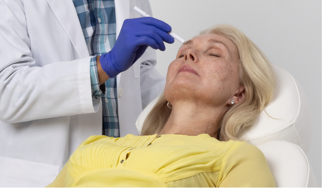 Woman asking her doctor about PDT treatment